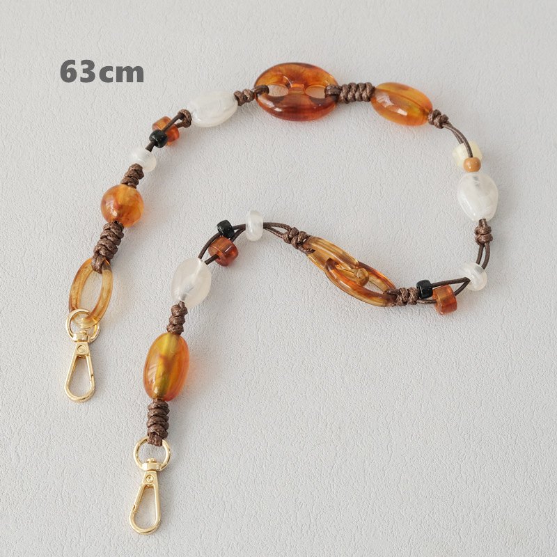 Long amber and white mixed-bead cord strap