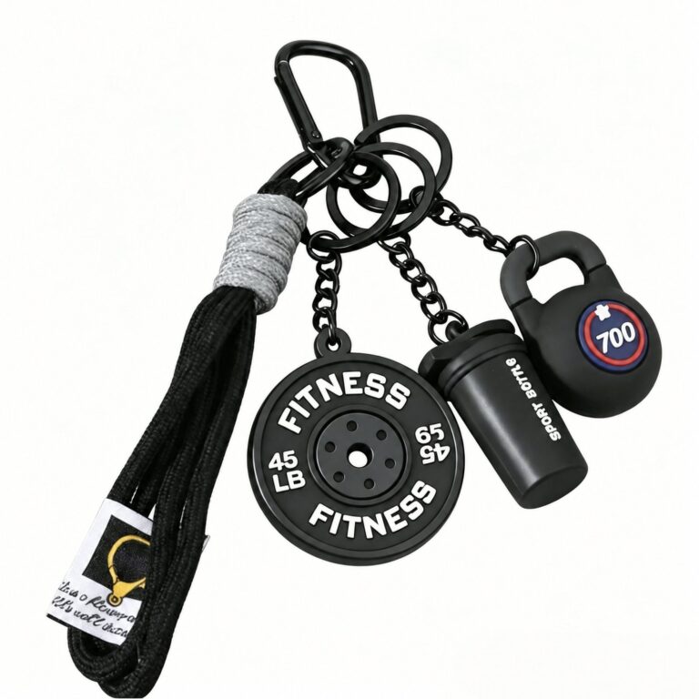 Black fitness-themed bag charm with miniature weight, bottle and kettlebell shapes