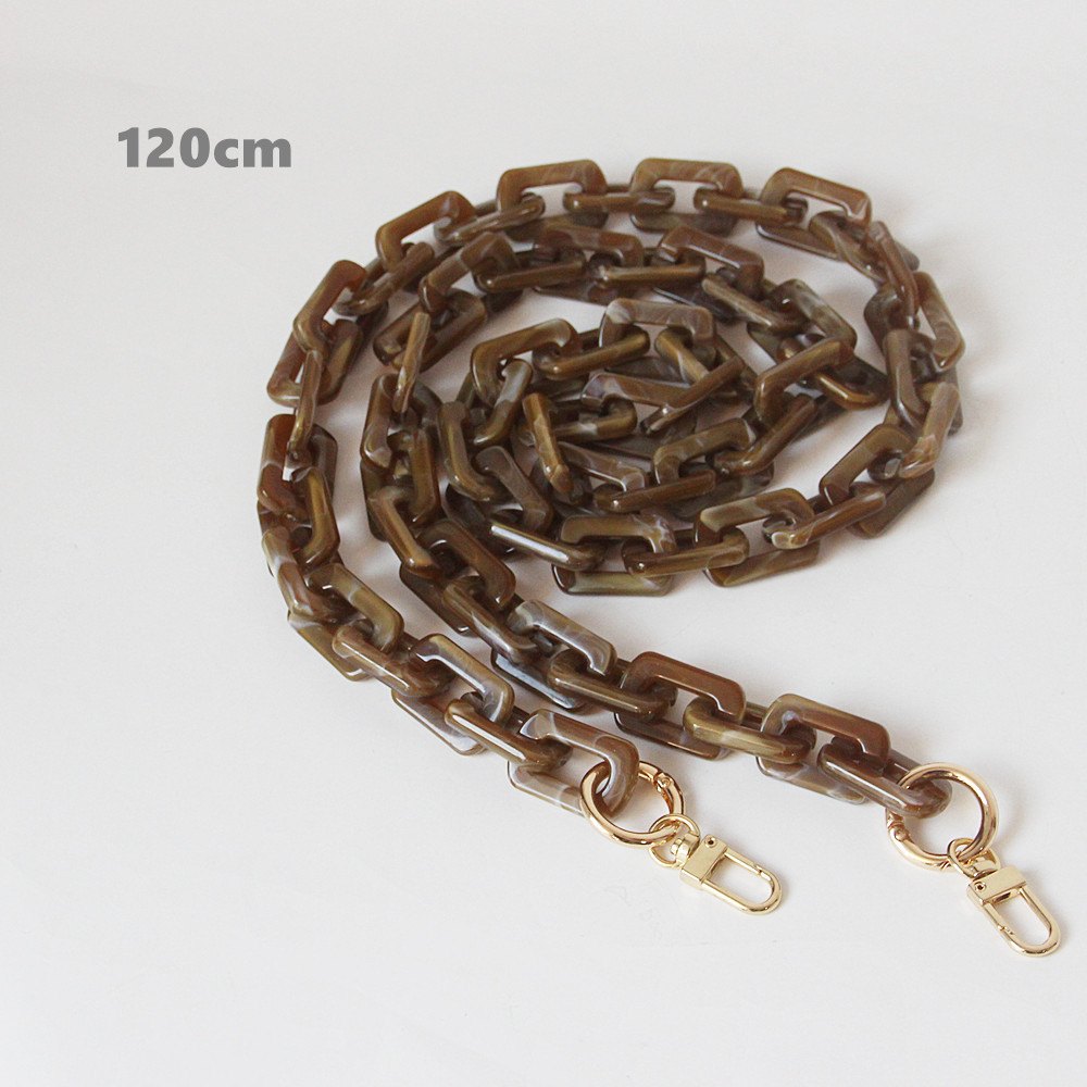 Extended brown rectangular-link strap in coiled view, shown with a source length label