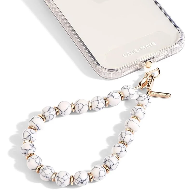 Custom pearl wristlet phone chain attached to clear phone case for phone strap buyers.