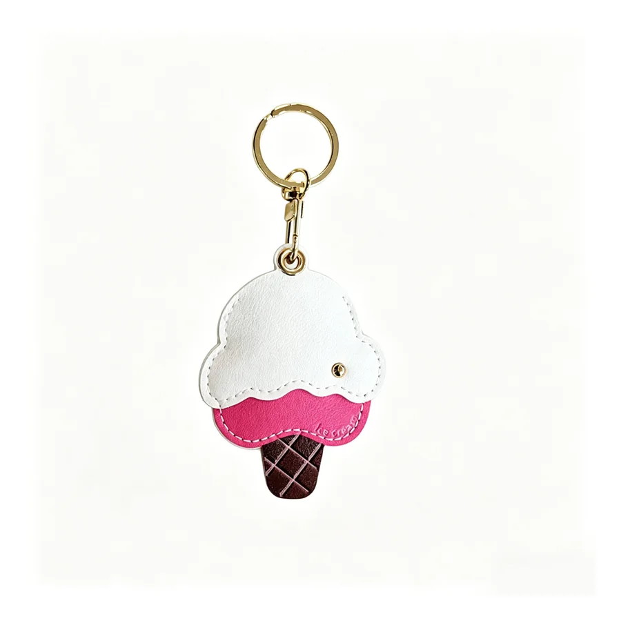 Custom plush fabric mini charm and zipper pull for gift shops and private label accessories.