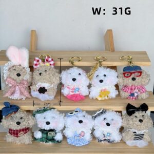 Ten dressed fuzzy animal charms on a wooden display