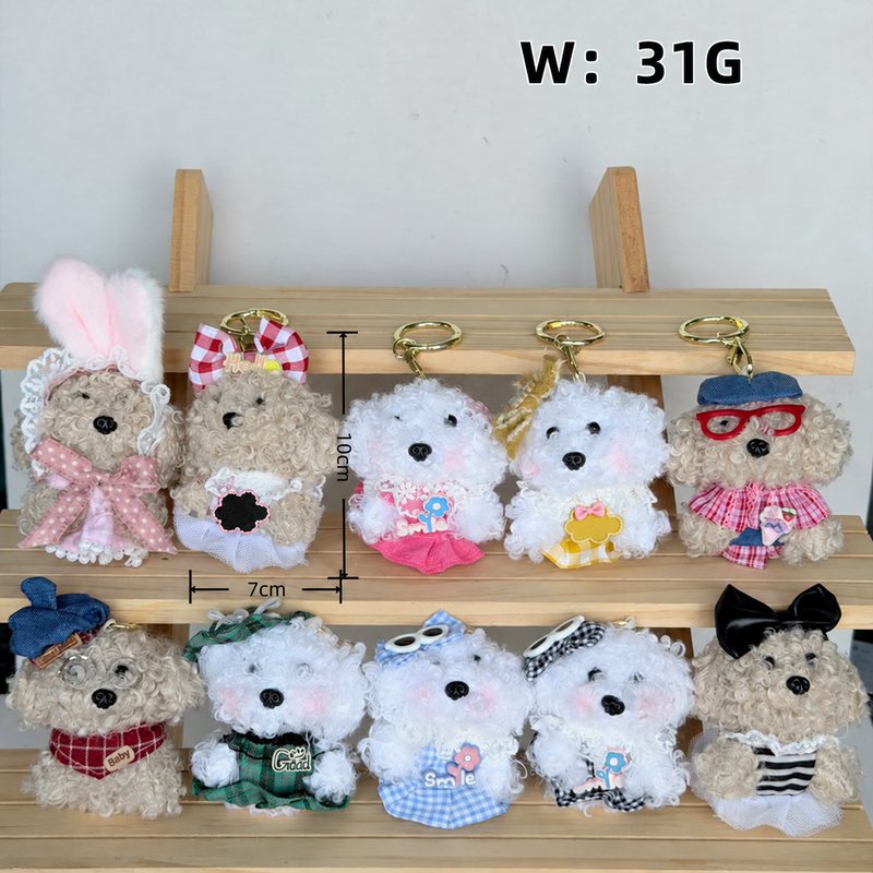 Ten dressed fuzzy animal charms on a wooden display