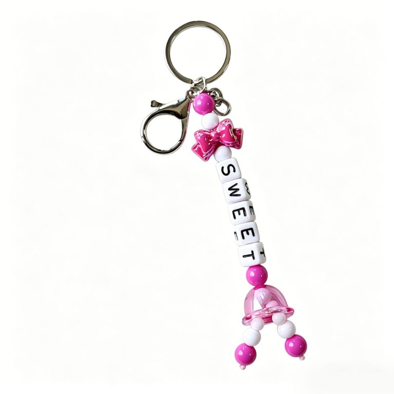 Pink and white SWEET letter-bead keychain with pink decorative charms