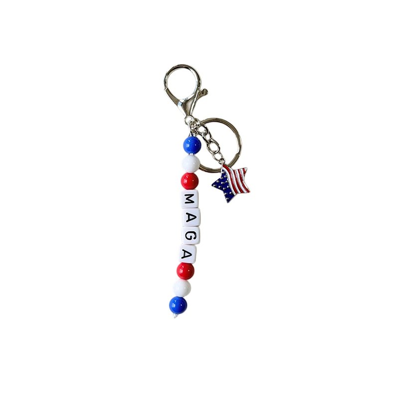 Flag charm and MAGA bead strand with round ring in red, white, blue, silver-tone, shown as a keychain.