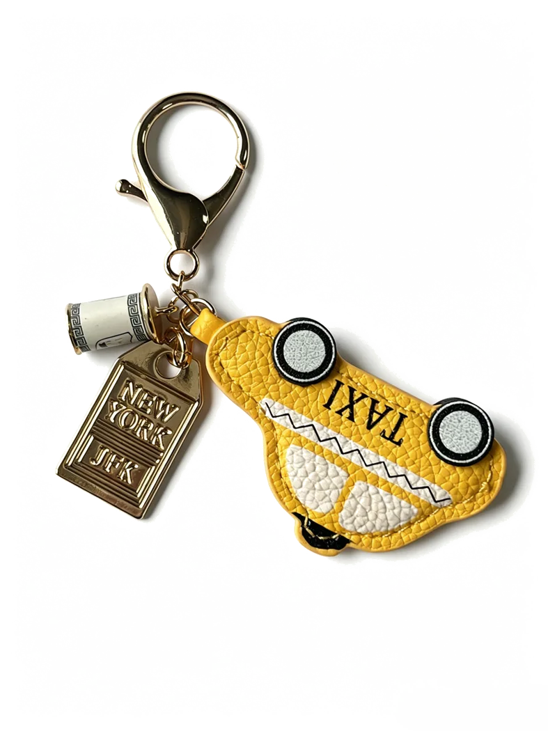 Custom yellow taxi metal keychain charm for bulk promotional merchandise.