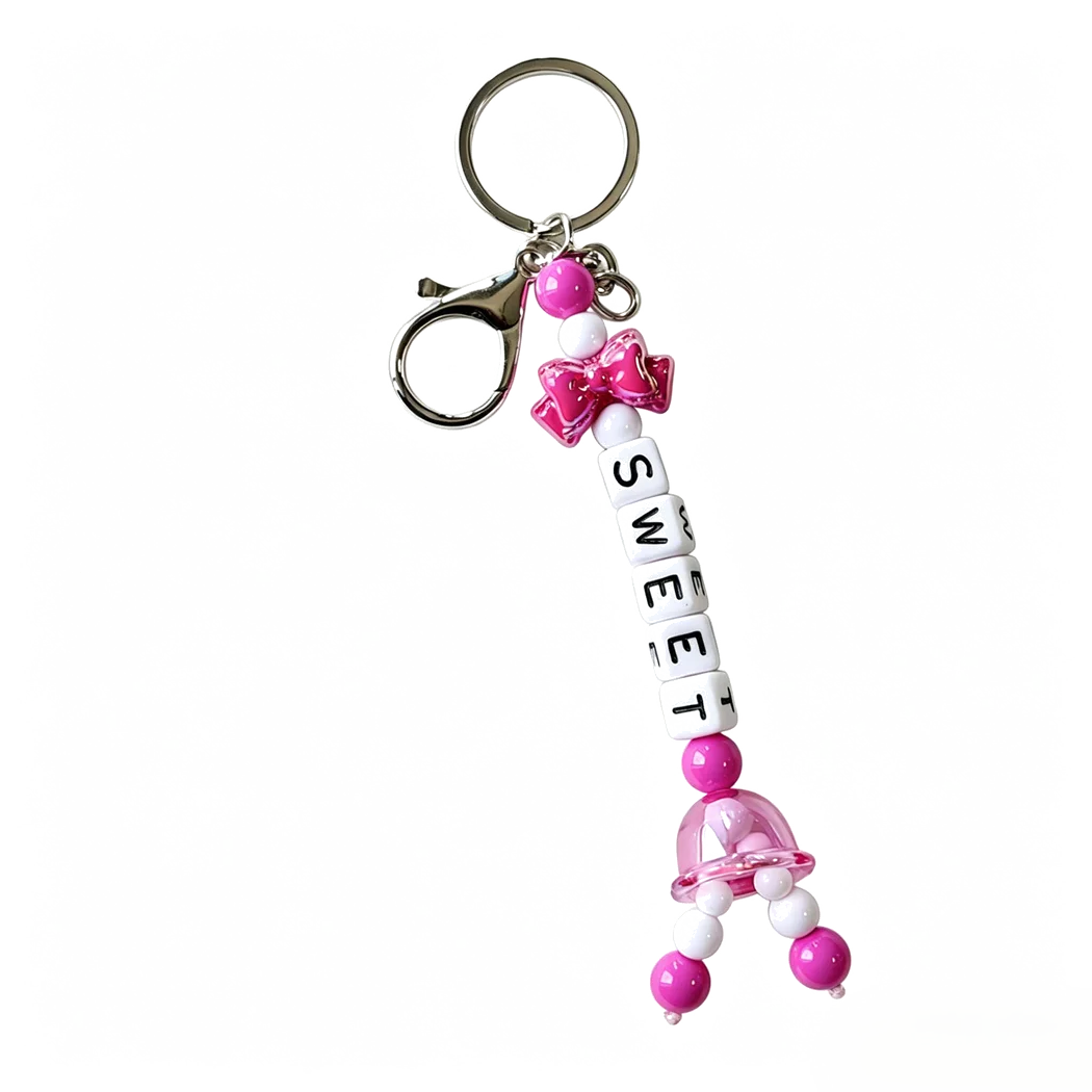 Custom sweet letter beaded tumbler charm for personalized drinkware accessory projects.