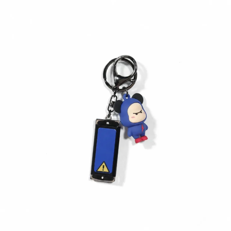 Blue hooded figure keyring with warning-style tag