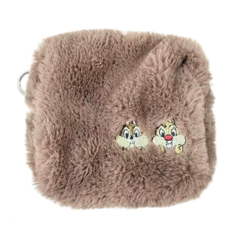 Brown fuzzy pouch with chipmunk character patch