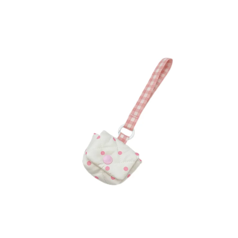 Cream dot pouch with pink wrist loop