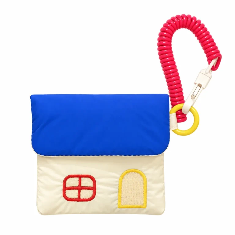 Cream house pouch with red coil clip