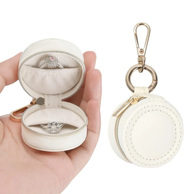 Cream round jewelry case in open and closed views