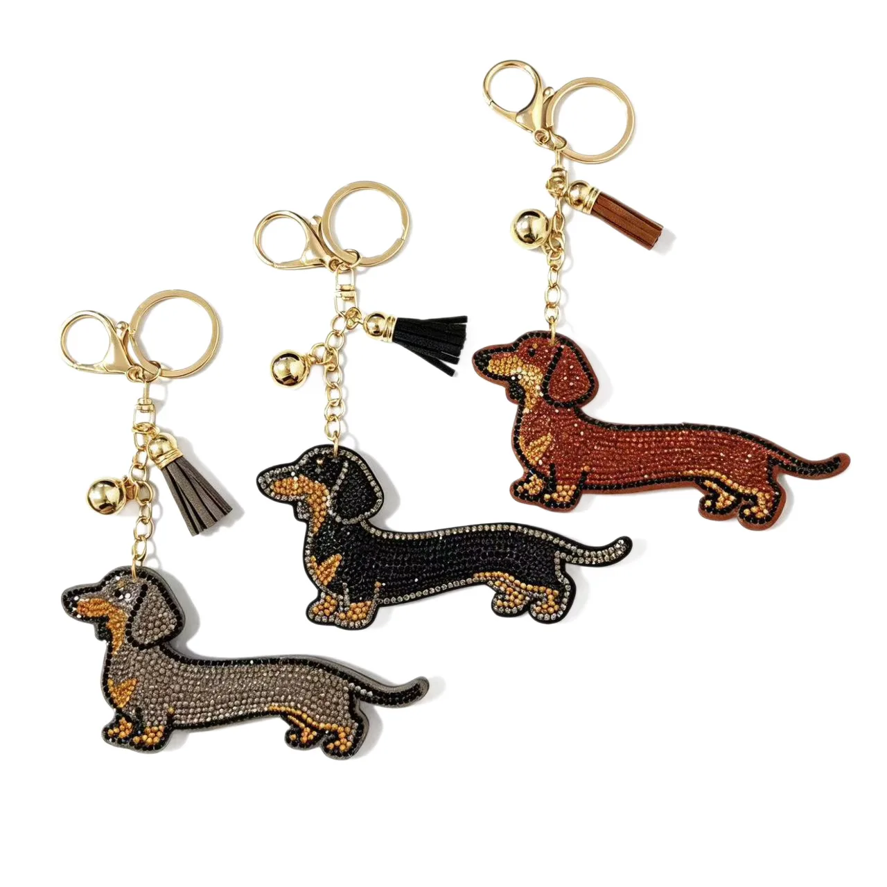 Grey, black and brown dachshund-shaped charms with matching tassels, bells, chains, rings and clasps.