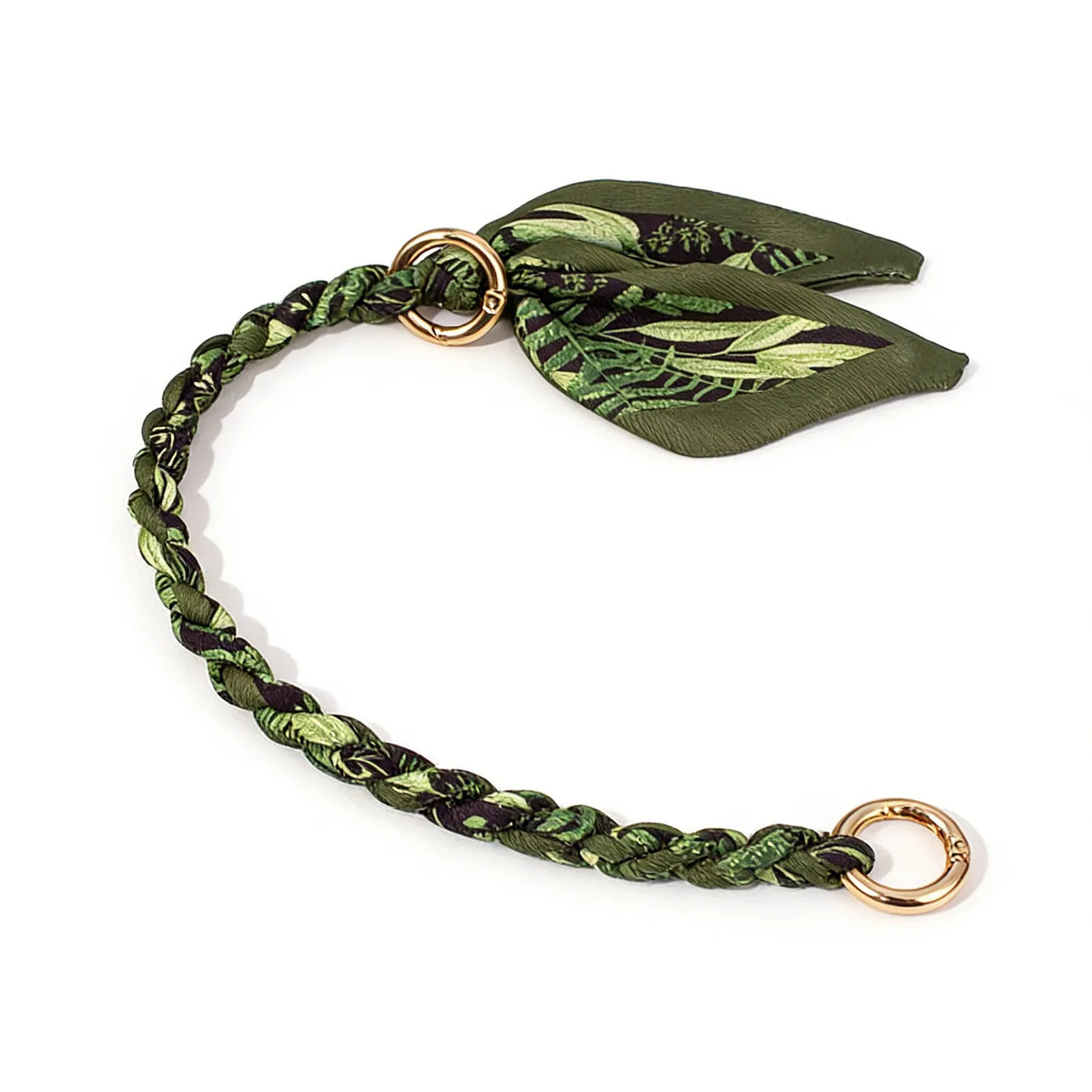Braided green leaf-pattern wrist loop with two gold-tone round clips.