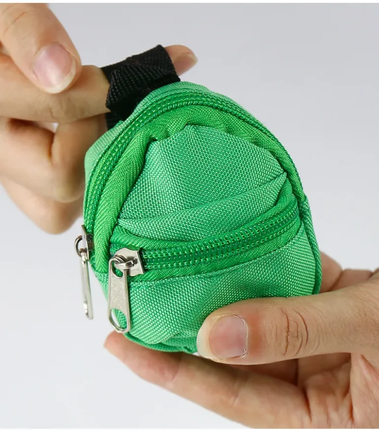 Green mini backpack pouch in hand