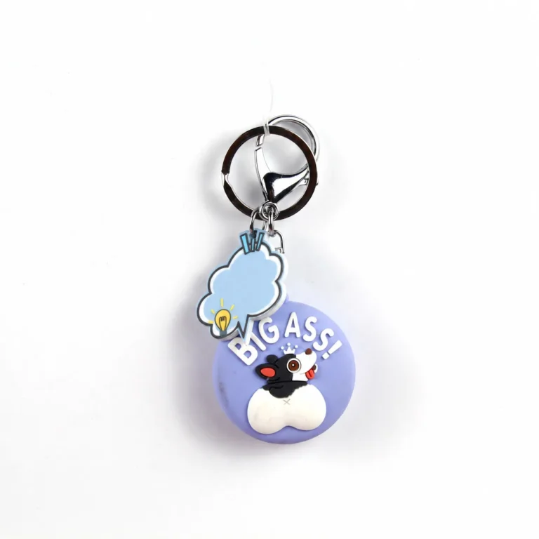 Rounded lettered pendant with animal-face and heart accents, speech-bubble charm, ring and clip in lavender, white, black, red, silver-tone, shown as a keychain.