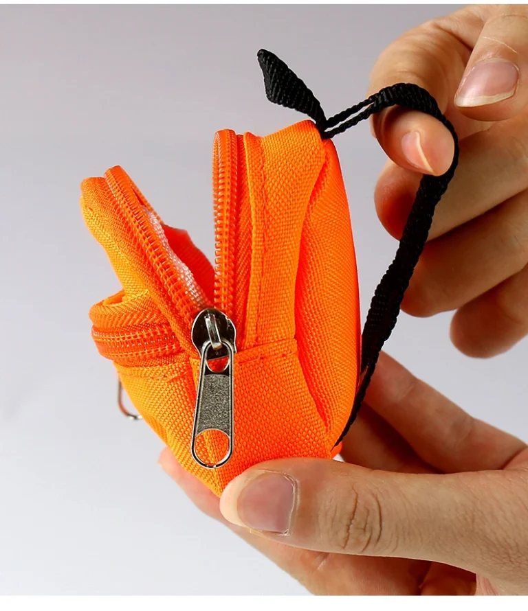 Orange mini backpack pouch in side detail