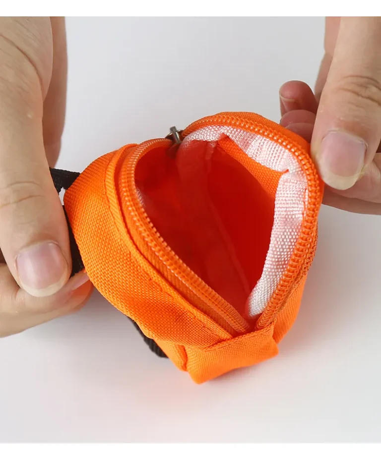 Orange mini backpack pouch with compartment open