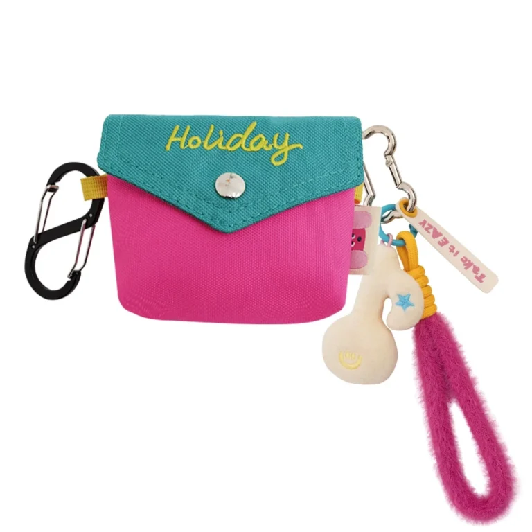 Pink-and-teal flap pouch with character and loop charms