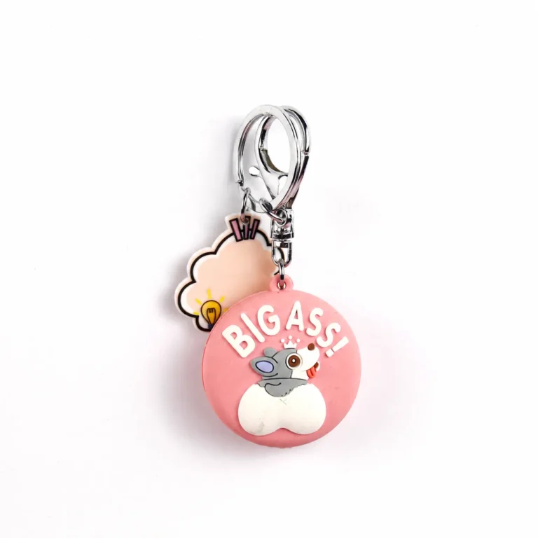 Rounded lettered pendant with animal-face and heart accents, speech-bubble charm, ring and clip in pink, white, gray, silver-tone, shown as a keychain.