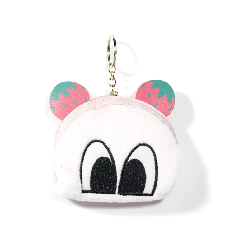 White fuzzy coin purse with strawberry-print ears