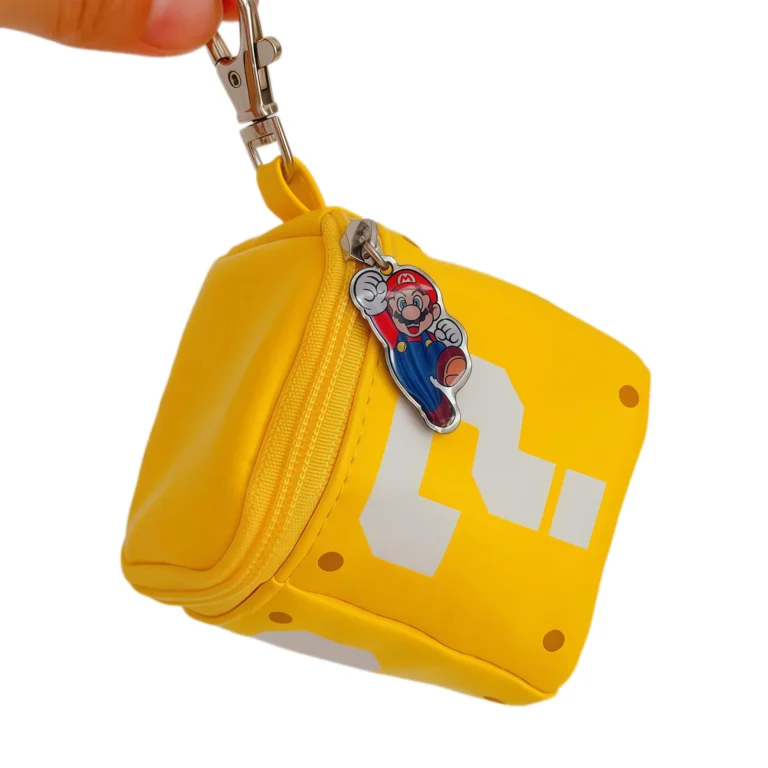 Yellow block-pattern zip pouch with character zipper charm