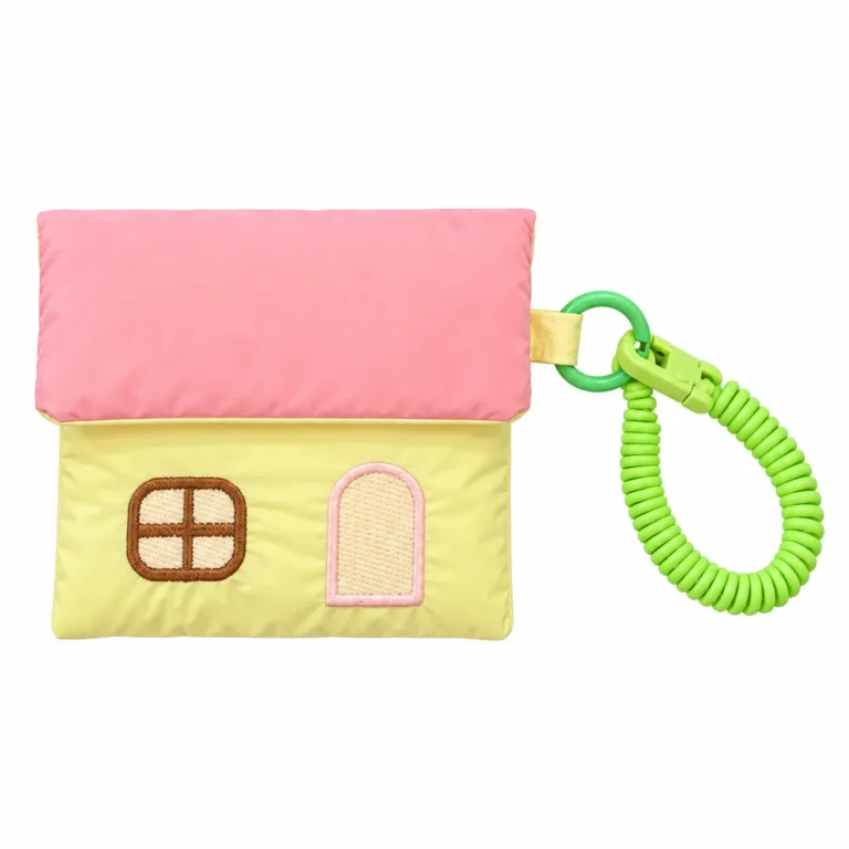 Yellow house pouch with green coil clip