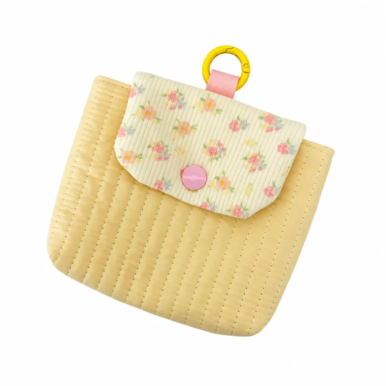 Yellow ribbed flap pouch with floral panel